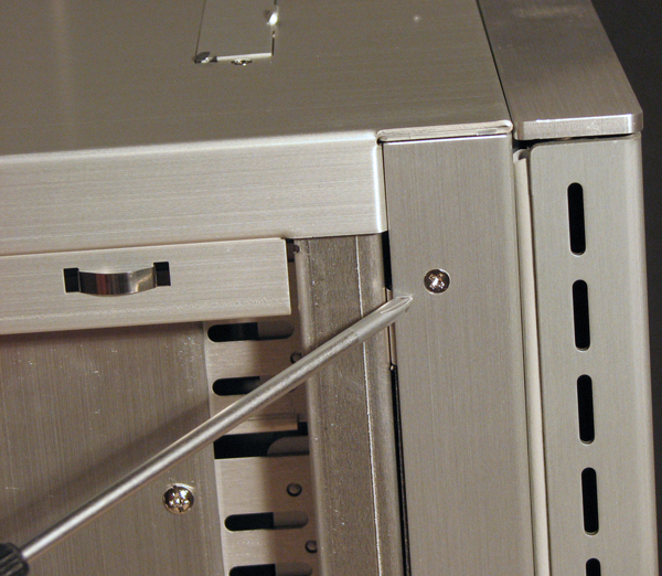 Remove Four Screws for Drive Bay Access